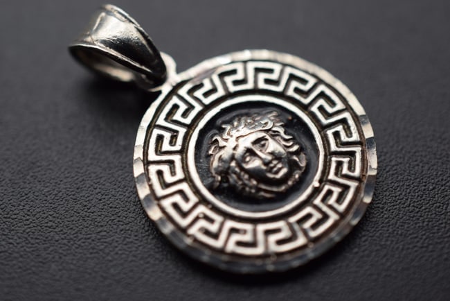 Versace Like Medusa Sterling Silver 925 Pendant Lot EH 470: Versace Like Medusa Sterling Silver 925 Pendant signed 925 on clasp measures 3/4" plus the bale weighs 3.76 grams