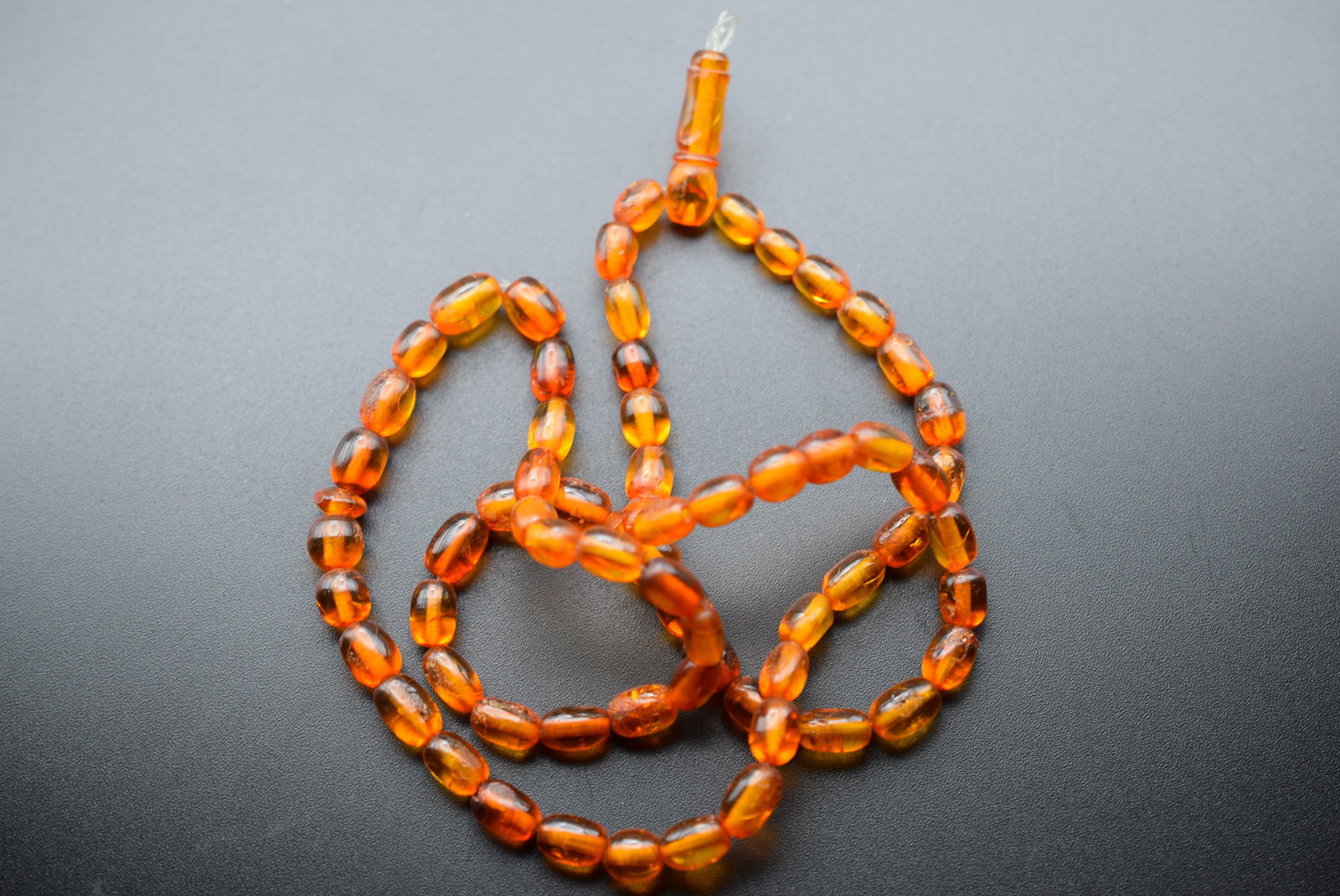 Genuine Amber VERY Old Tasbih Prayer Meditation Beads Lot EH 603: Genuine Amber VERY Old Tasbih Prayer Meditation Beads Lovely old amber with character in every bead with each mark and crackle as old amber does, 68 beadsplus drop bead measures 23" long beads are 9mm