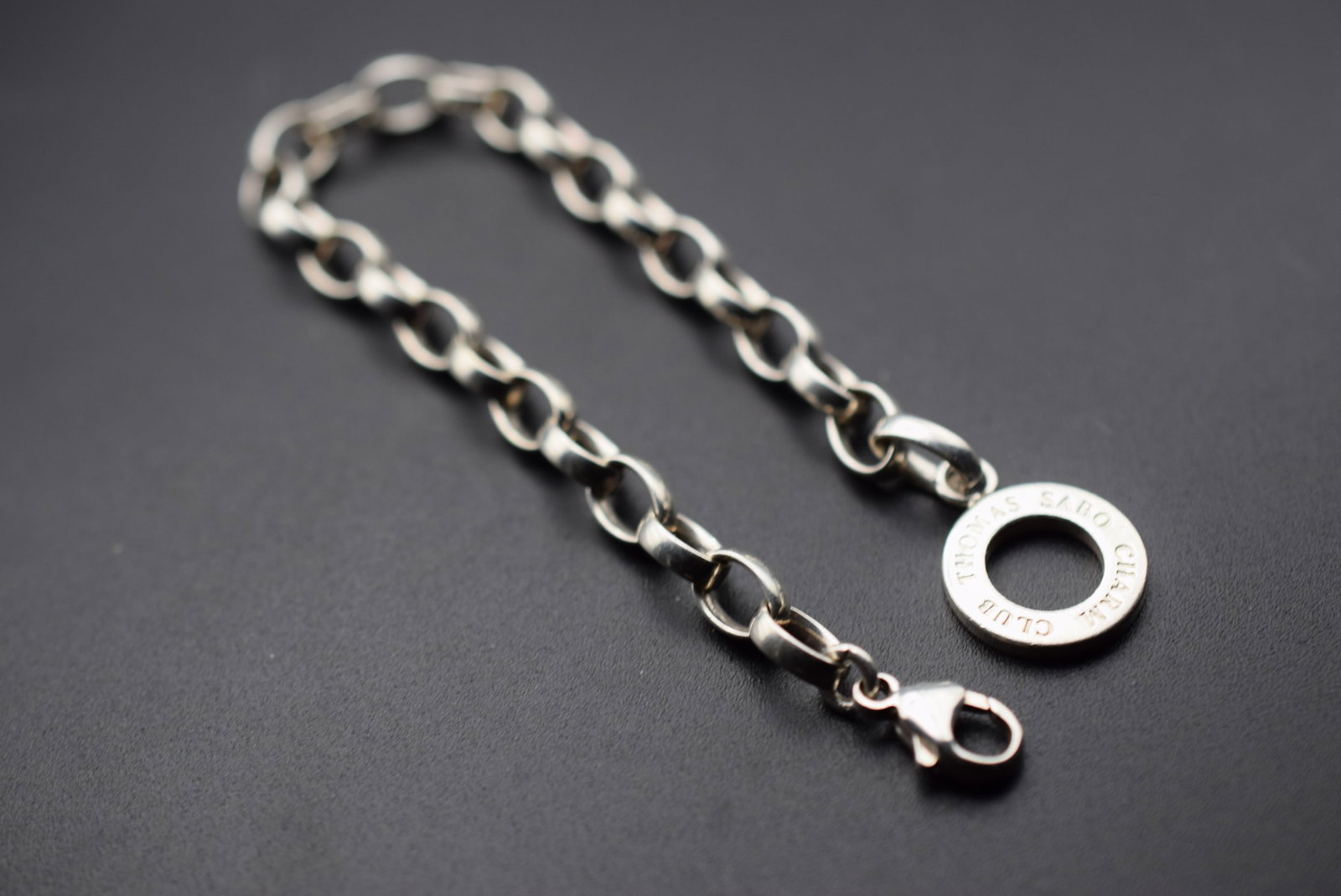 Thomas Sabo Charm Blub Sterling Silver 925 Charm and Bracelet Lot EH 665: Thomas Sabo Charm Blub Sterling Silver 925 Charm and Bracelet measures 7 1/4" long signed Thomas Sabo Charm Club 925 on clasp weighs 14.56 grams