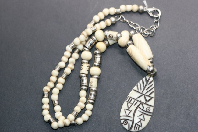 Bone Necklace Vintage Lot 803: Bone Necklace Vintage measures 19" long plus the drop pendant measures 1 1/2" x 3/4"