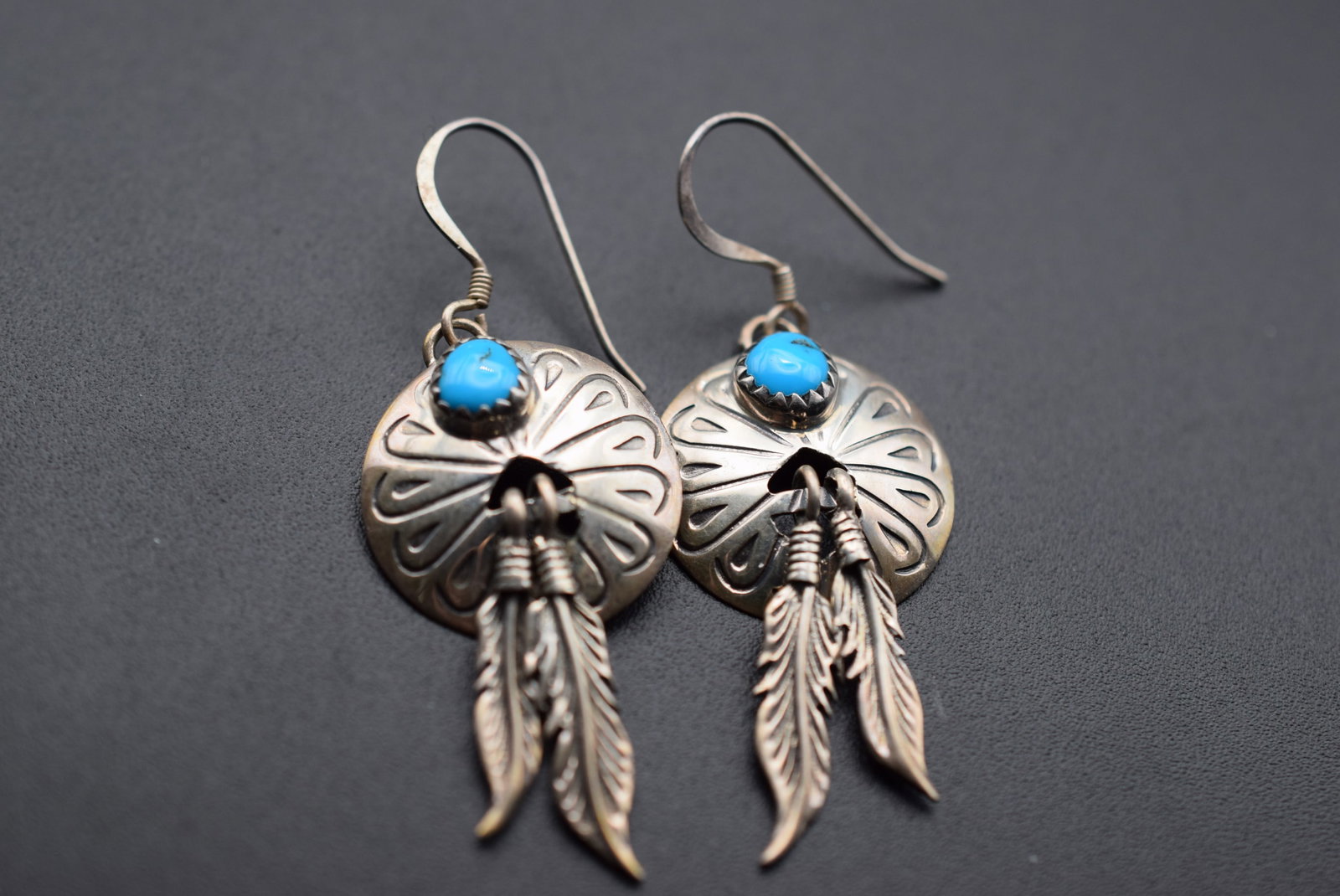 Navajo Sterling Feather Pierced Turquoise Earrings Lot EH 810: Navajo Sterling Feather Pierced Turquoise Earrings measures 1 1/2" x 7/8" plus the bale signed 925 on the bale weighs 5.57 grams