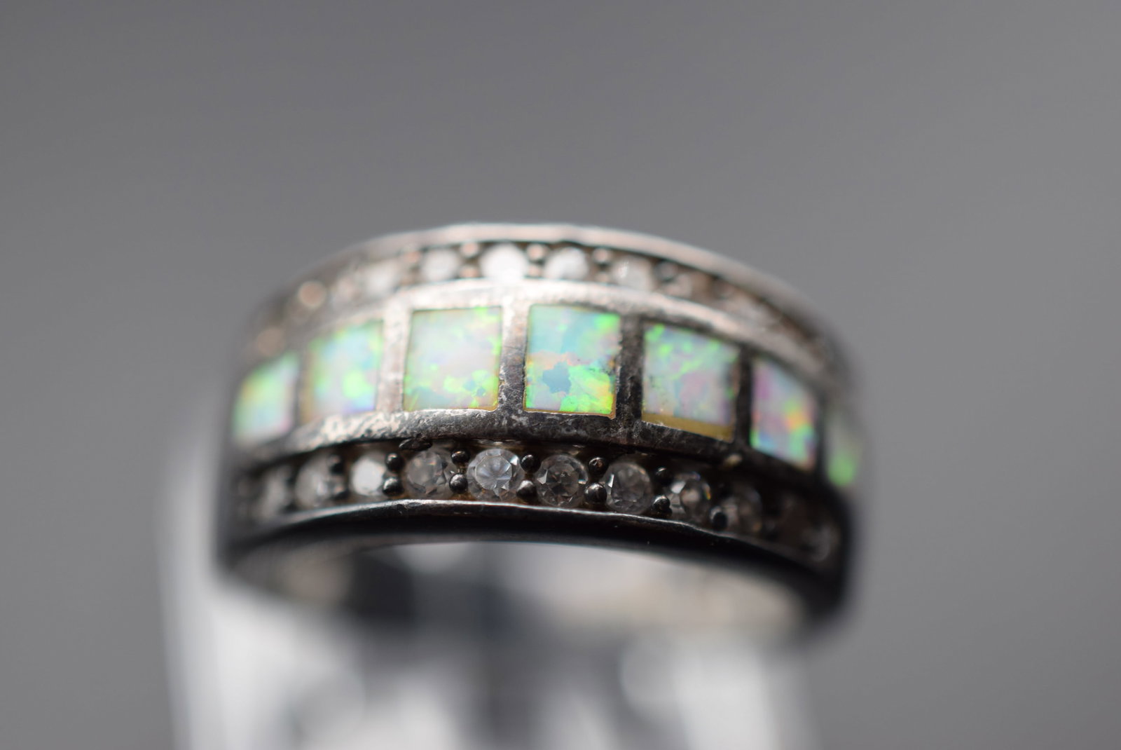 CZ Opal Sterling Silver 925 Vintage Ring Size 7.75 Lot EH 919: CZ Opal Sterling Silver 925 Vintage Ring Size 7.75 measures 3/8" wide signed Sterling weighs 6.05 grams