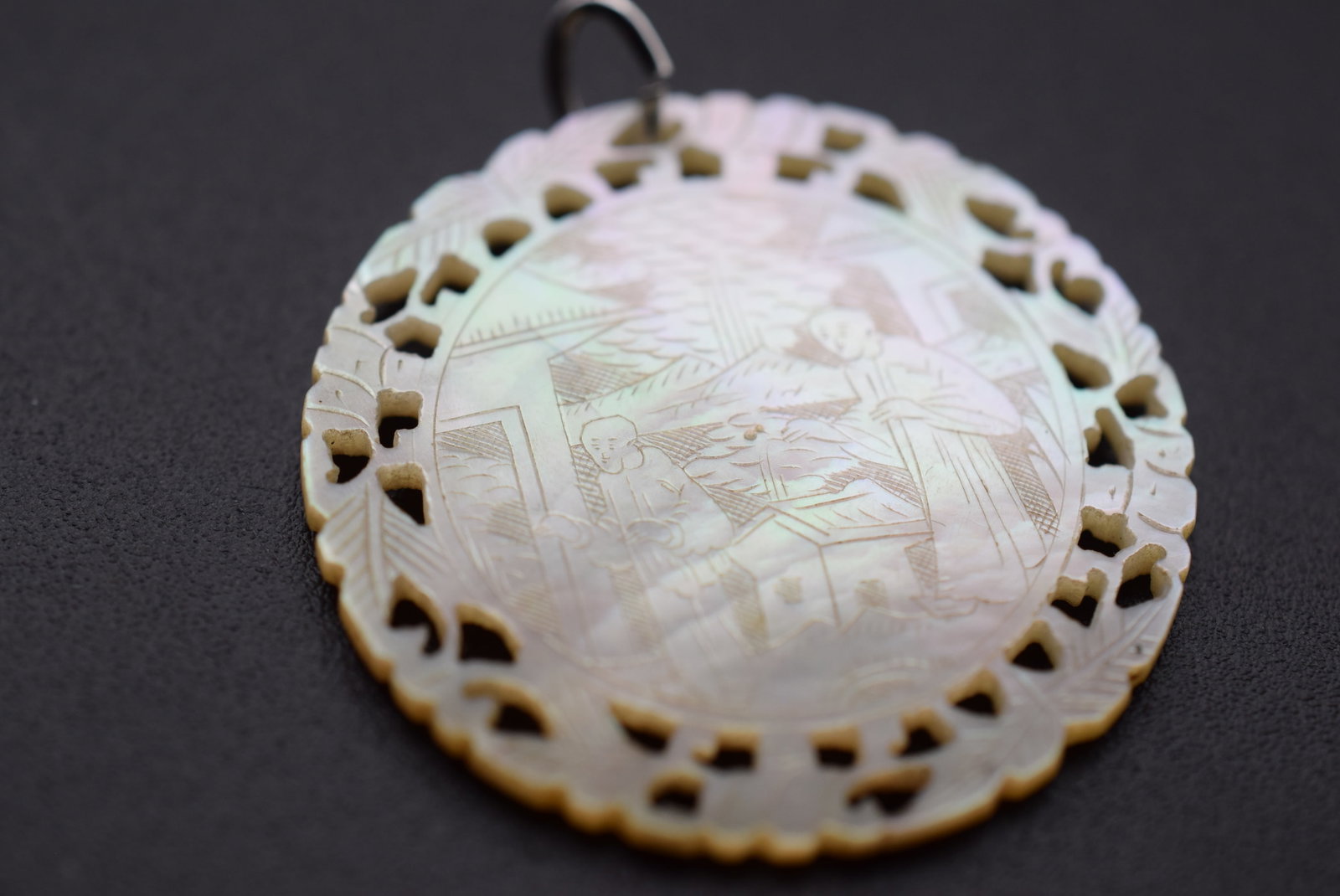 Mother of Pearl Carved Scene Pendant Vintage 2 sided Lot EH 931: Mother of Pearl Carved Scene Pendant Vintage 2 sided measures 1 3/8" in diameter