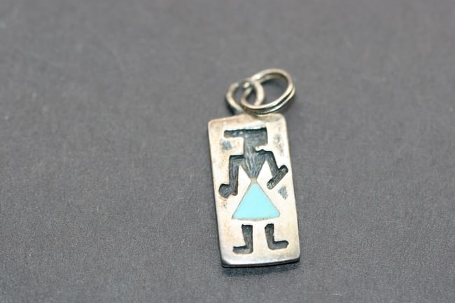 Sterling Silver Inca Man Turquoise Pendant Charm Lot 943: Sterling Silver Inca Man Turquoise Pendant Charm unsigned measures 3/4" x 3/8"