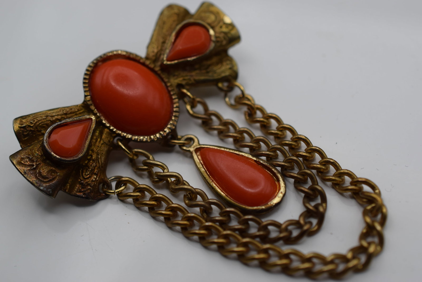 Coral Color Rhinestone Opaque Brooch Vintage Lot HK 989: Coral Color Rhinestone Opaque Brooch Vintage measures 2 1/8" x 2 5/8"