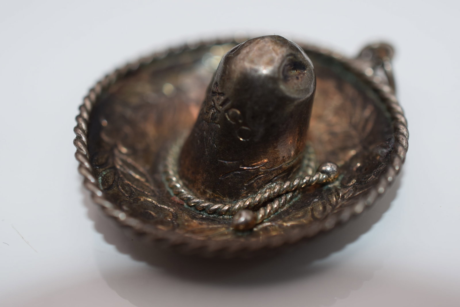 Eagle Sterling Large Sombrero Pendant Sterling Silver 925 Lot EH 1021: Eagle Sterling Large Sombrero Pendant Sterling Silver 925 measures 1 1/4" has a bend in it like any old sombrero should and is signed on the front top and 3 inside eagle mark on the bottom weighs 5.13