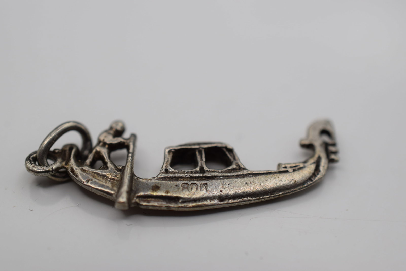 Man On Boat 800 Charm Sterling Vintage Pendant Lot HK 1182: Man On Boat 800 Charm Sterling Vintage Pendant stamped 800 on the boat hull and measures 1 1/8" long without the bale