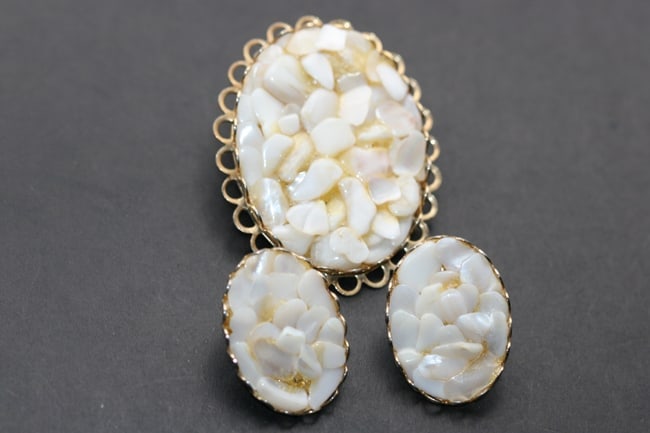 Set Brooch Earrings Vintage Mother of Pearl Hand Made Lot 1190: Set Brooch Earrings Vintage Mother of Pearl Hand Made brooch measures 2" x 1 1/2" and the matching clip earrings measure 1 1/8"x3/4"