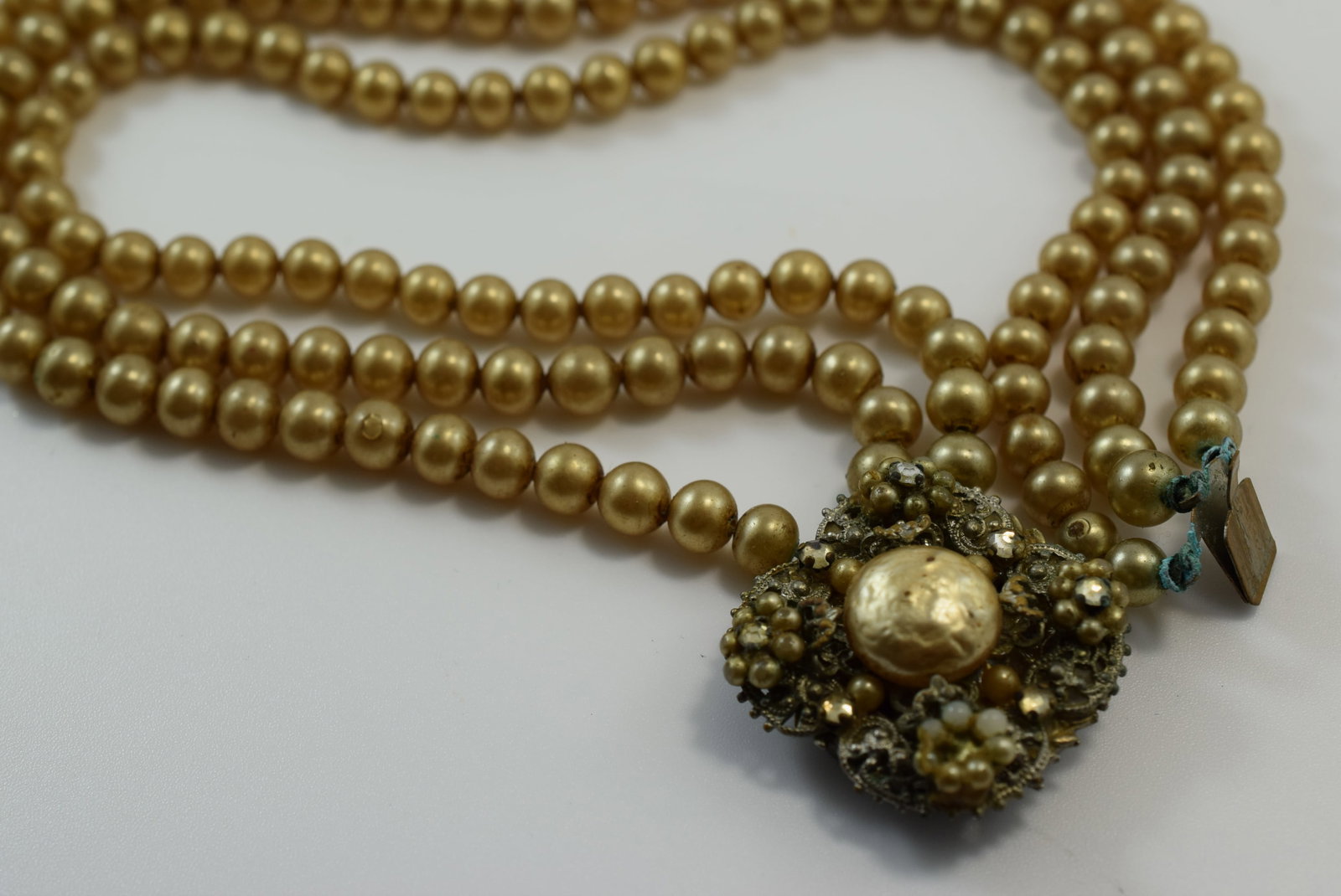 Miriam Unsigned Seed Pearl Glass Choker Necklace 1940's Vintage Lot IL 438: Miriam Unsigned Seed Pearl Glass Choker Necklace 1940's Vintage measures 13 3/4" long some wear to the little seed pearls on clasp and verdigris on the on the hooks near the clasp