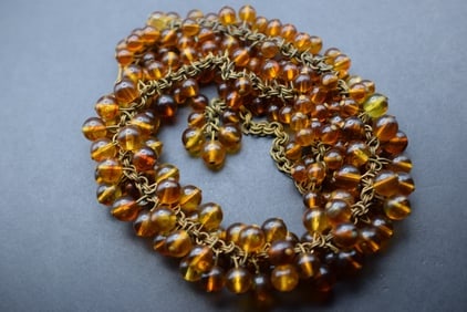 Amber Cluster Necklace Vintage Lot 645: Amber Cluster Necklace Vintage measures 17" long x 1 1/4" wide weighs 67.28 grams untested looks like pressed amber