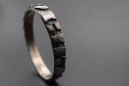 Brutalist Metal Bangle Bracelet Lot 804: Brutalist Metal Bangle Bracelet measures 2 1/2" across the insideand is 3/8" wide weighs 47.17 grams