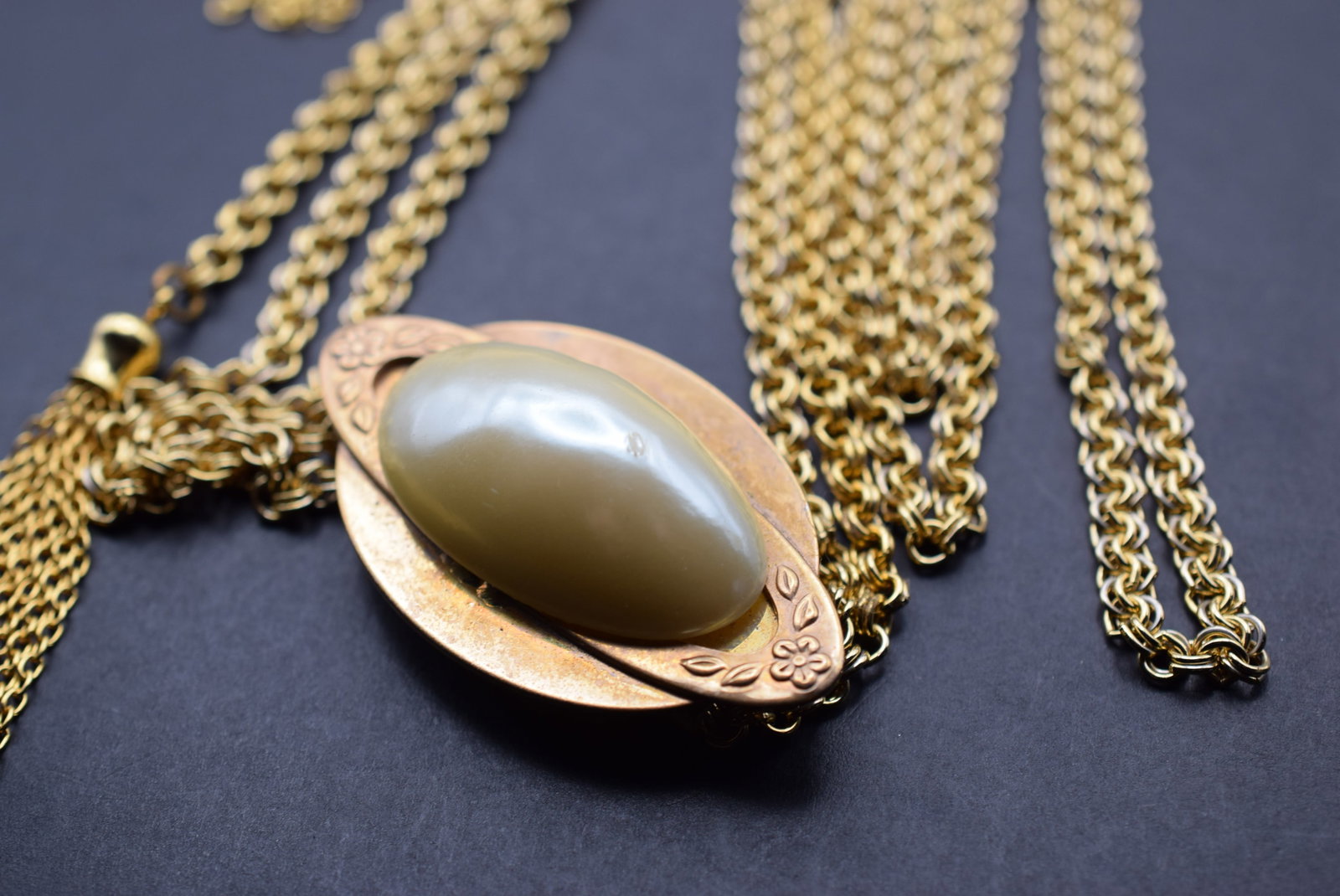 Slide Faux Pearl Necklace 45" Long Lot 932: Slide Faux Pearl Necklace 45" Long has a nick and scratch on the oblong pearl see photos