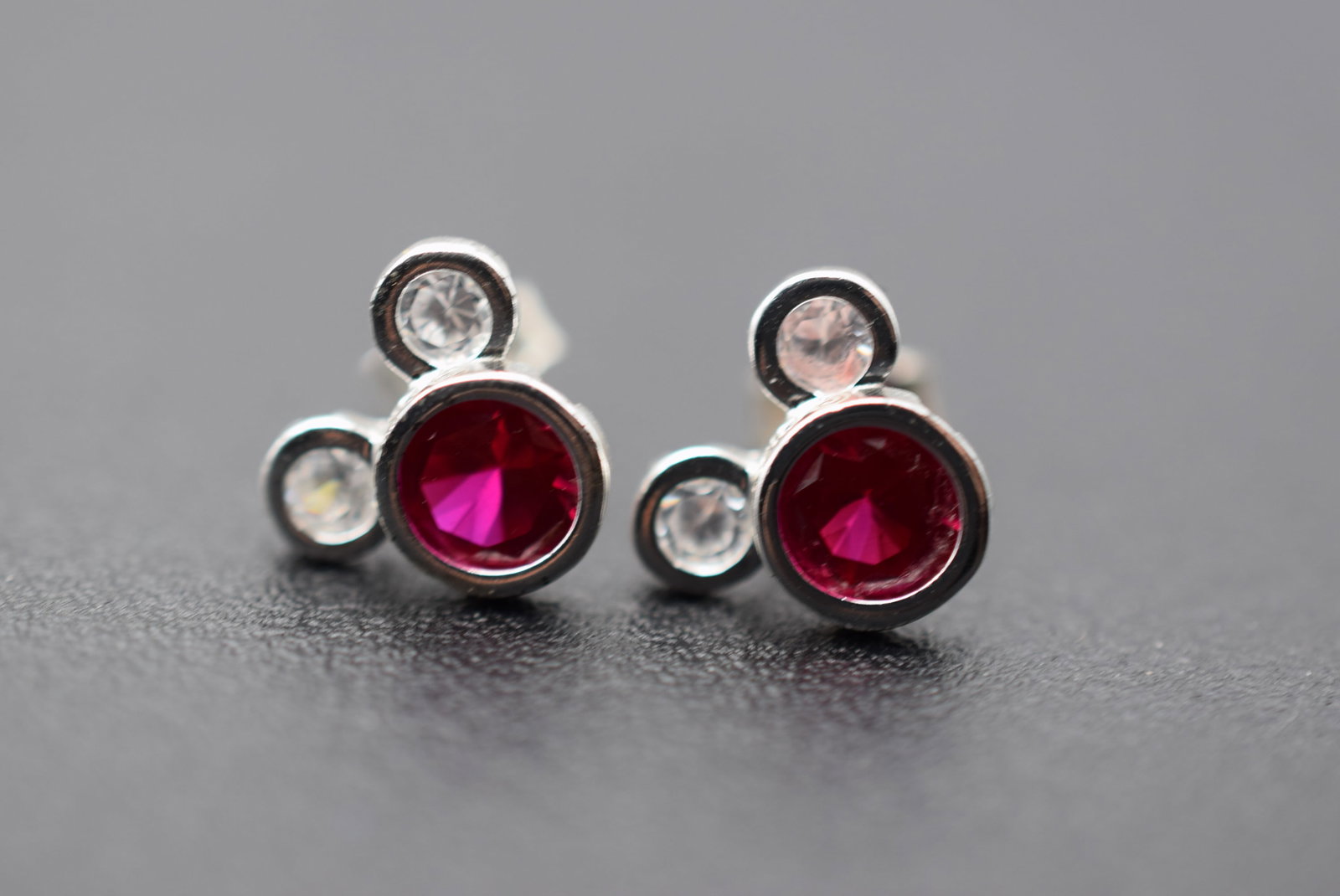 Sterling Silver 925 CZ Cubic Mickey Mouse Stud Earrings Lot 993: Sterling Silver 925 CZ Cubic Mickey Mouse Stud Earrings measures 3/8" x 3/8" signed 925 on the backings