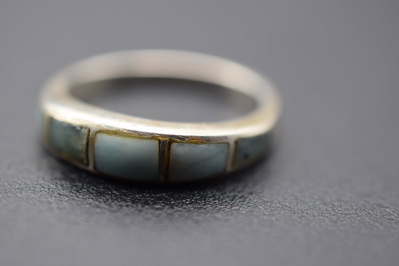 Larimar Inlaid Sterling Silver 925 Ring Size 7.75 Lot 1099: Larimar Inlaid Sterling Silver 925 Ring Size 7.75 weighs 3.08 grams signed inside 925 top measures 1/4"