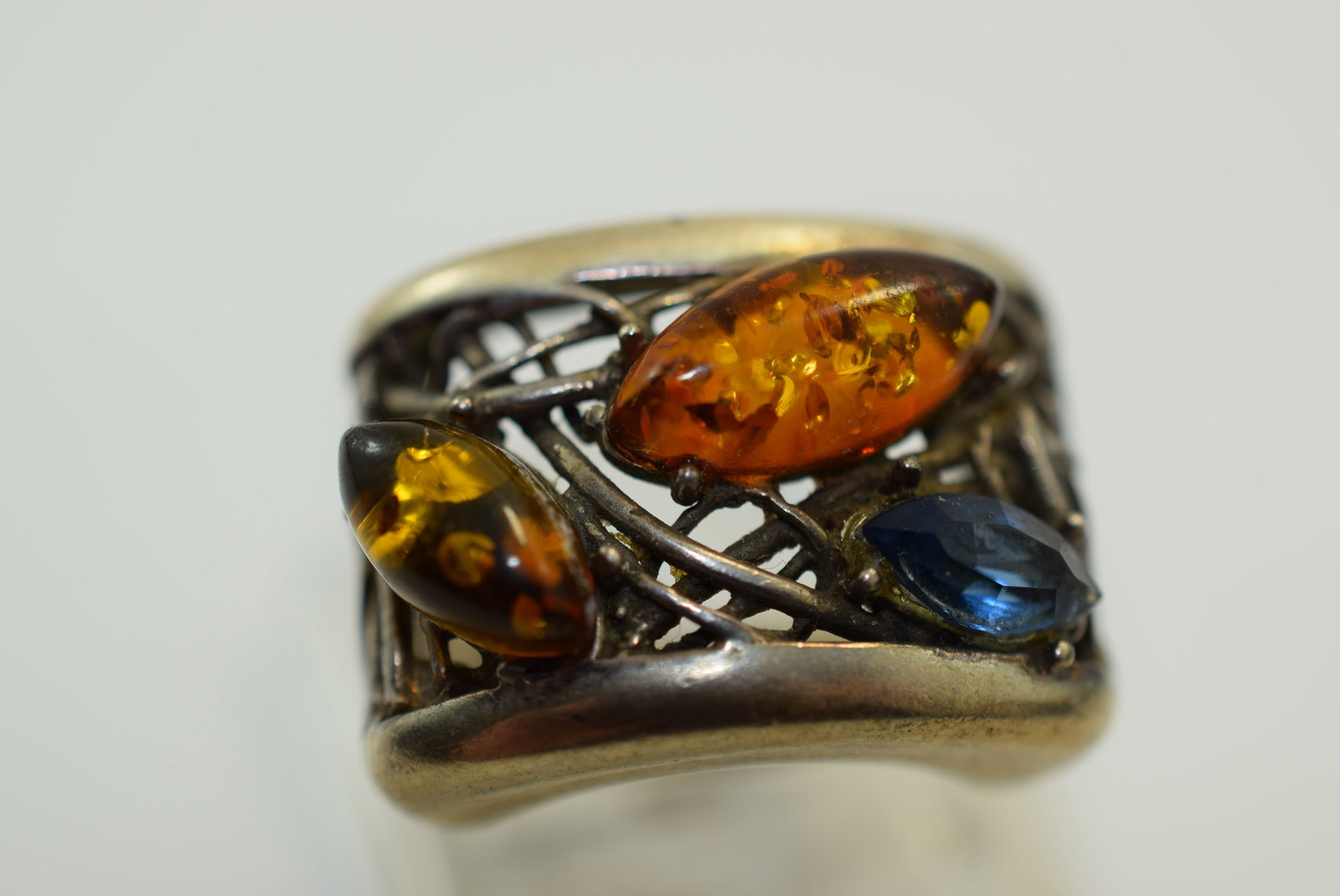 Amber Filigree Hallmarked Huge Vintage Sterling Ring Size 7.25 Lot IL 1157: Amber Filigree Hallmarked Huge Vintage Sterling Ring Size 7.25 top measures 1" x 3/4" hallmarked G. 925 AD Ladys head and other markings on the outside of the shank weighs 8.47 grams