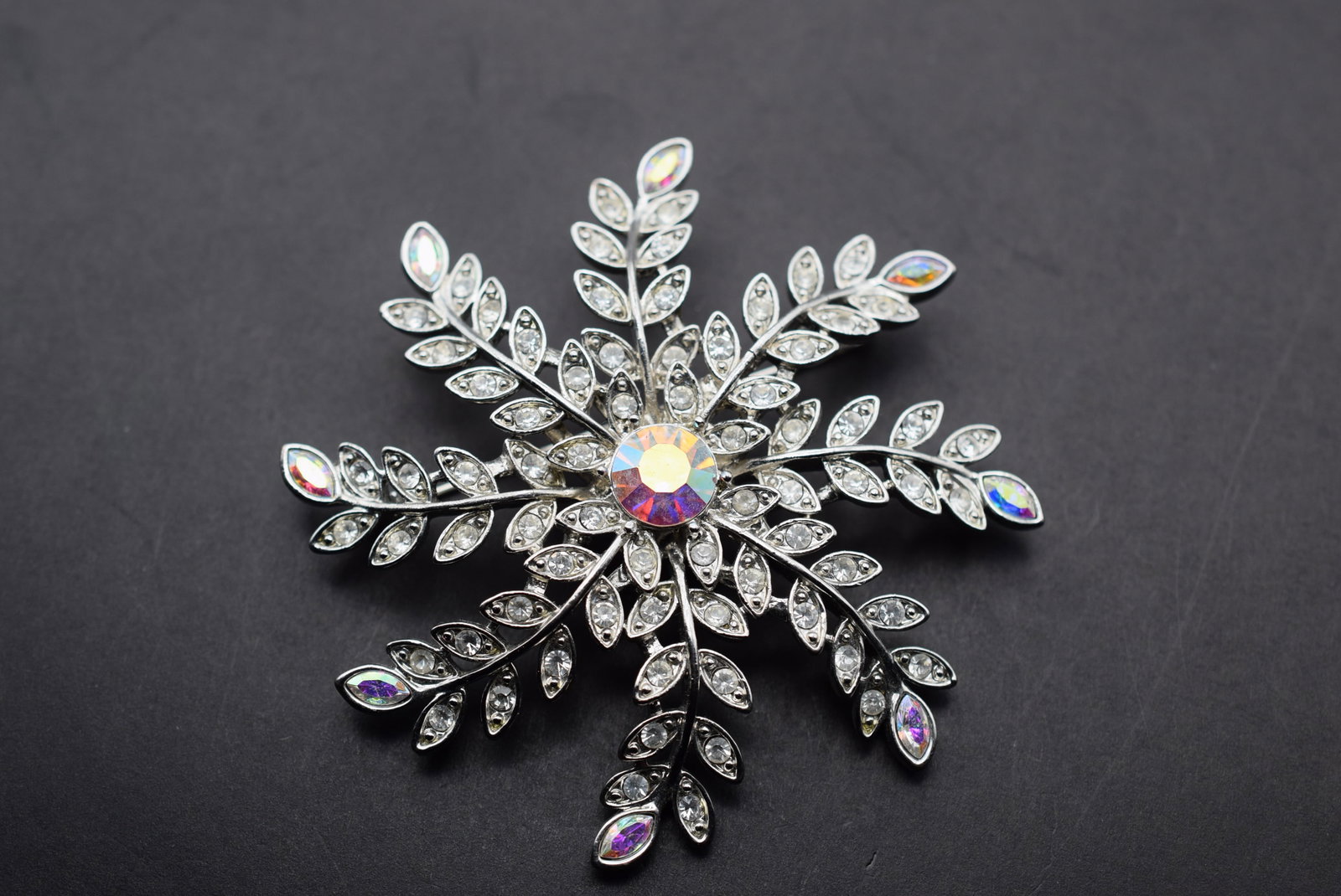 Avon SP Vintage 1960's Brooch Pin Rhinestones Huge Starburst Lot 72: Avon SP Vintage 1960's Brooch Pin Rhinestones Huge Starburst signed on the inside Avon SP measures 3" in diameter