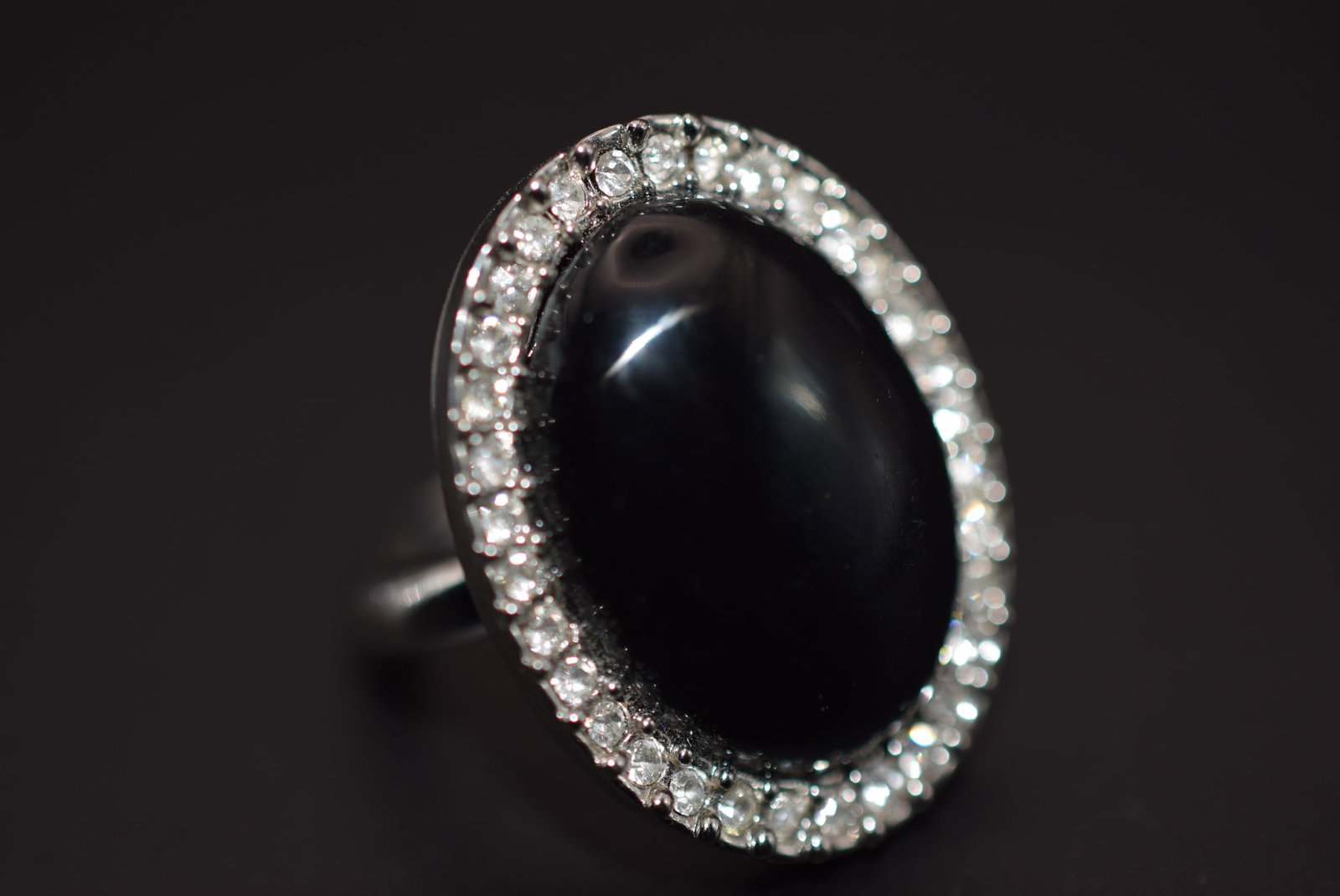 Filorelli Italy Black and CZ Crystal Silver Plated Ring Size 5.75 Lot 341: Filorelli Italy Black and CZ Crystal Silver Plated Ring Size 5.75 Top measures 1 1/8" x 7/8" signed Fiorelli
