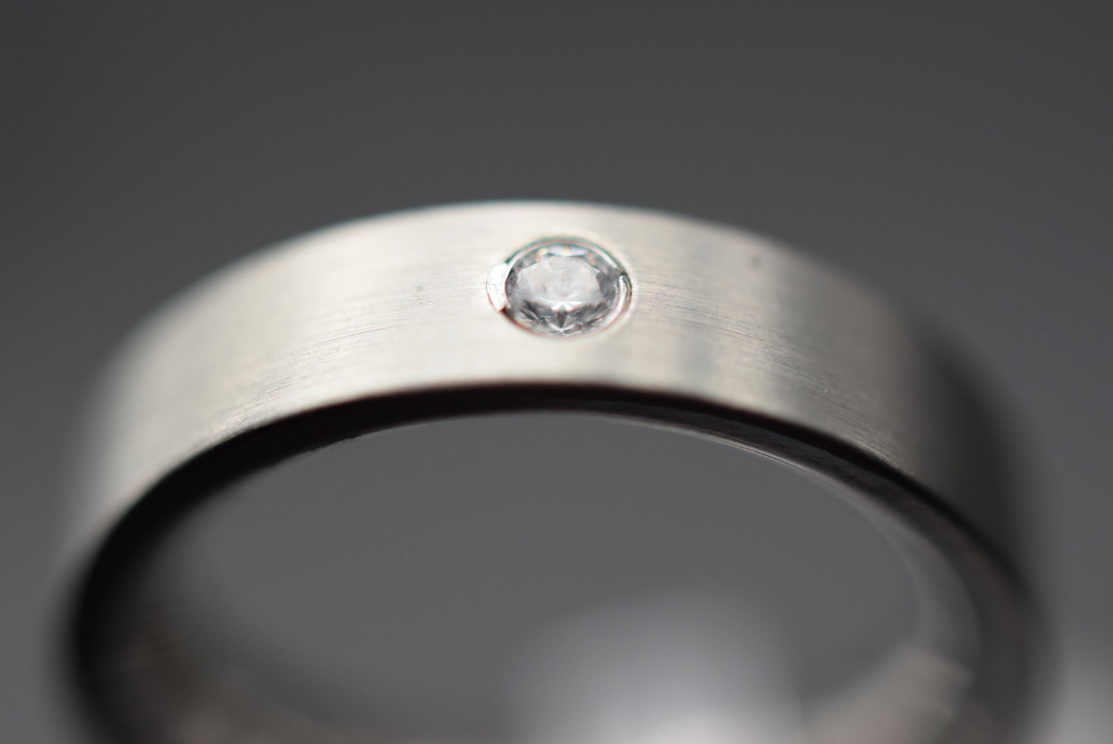 Lumani Stainless Steel Ring Size 6.5 Lot 347: Lumani Stainless Steel Ring Size 6.5 Top measures 1/4" signed Lumani