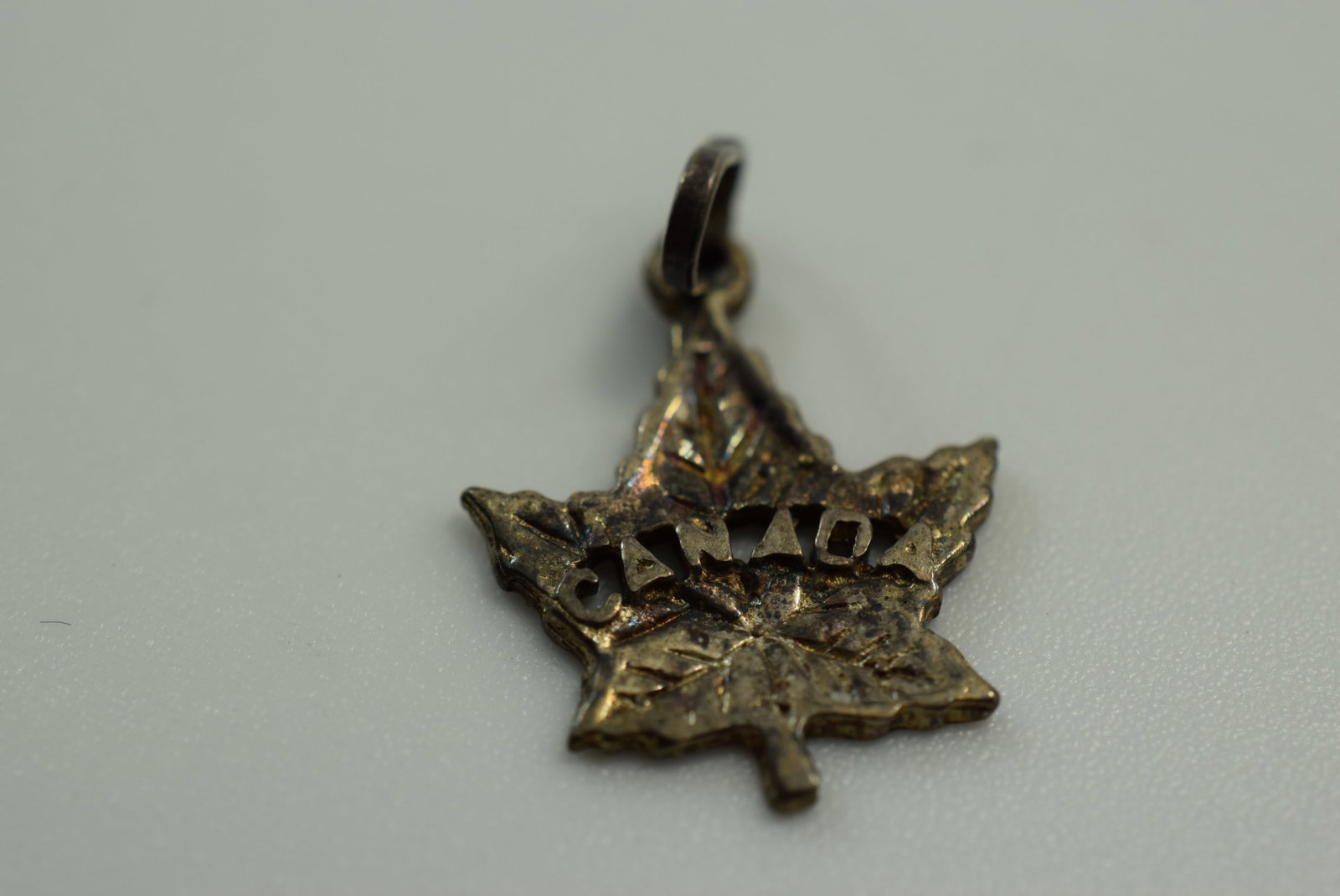 Maple Leaf Sterling Silver 925 Charm Pendant Vintage Lot # JM 401: Maple Leaf Sterling Silver 925 Charm Pendant Vintage measures 5/8" plus the bale signer Ster
