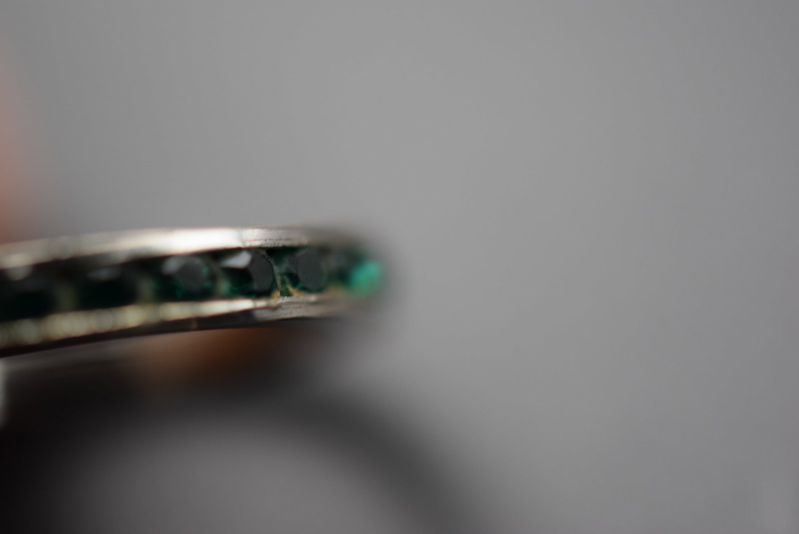 Eternity Green CZ Sterling Silver 925 Ring Size 6.75 Lot 404: Eternity Green CZ Sterling Silver 925 Ring Size 6.75 Weighs 1.88 grams Top measures 1/8" signed Sterling