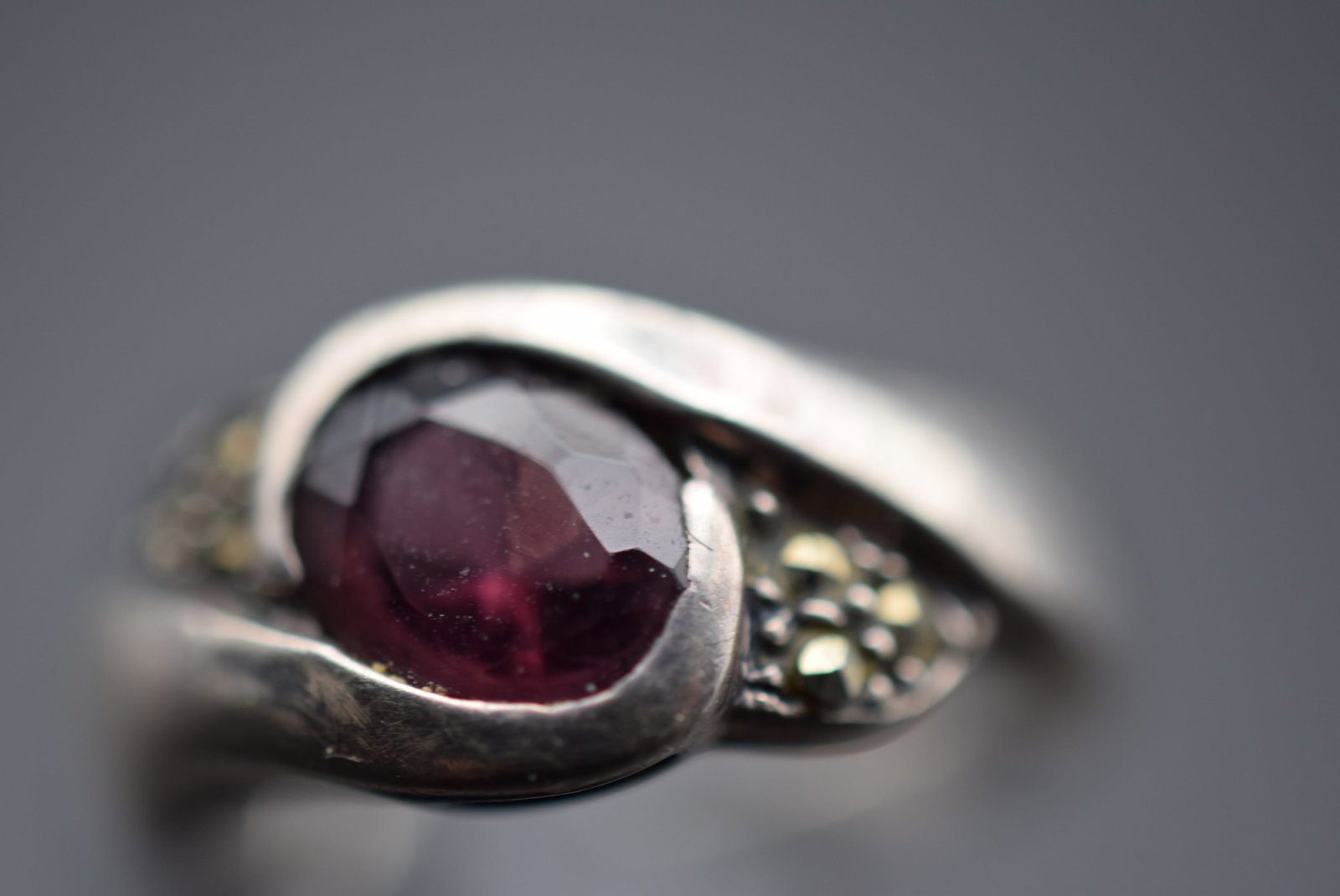 Amethyst CZ Marcasite Sterling Silver 925 Ring Size 6.5 Lot 528: Amethyst CZ Marcasite Sterling Silver 925 Ring Size 6.5 Weighs 2.48 grams Top measures 3/8" signed 925