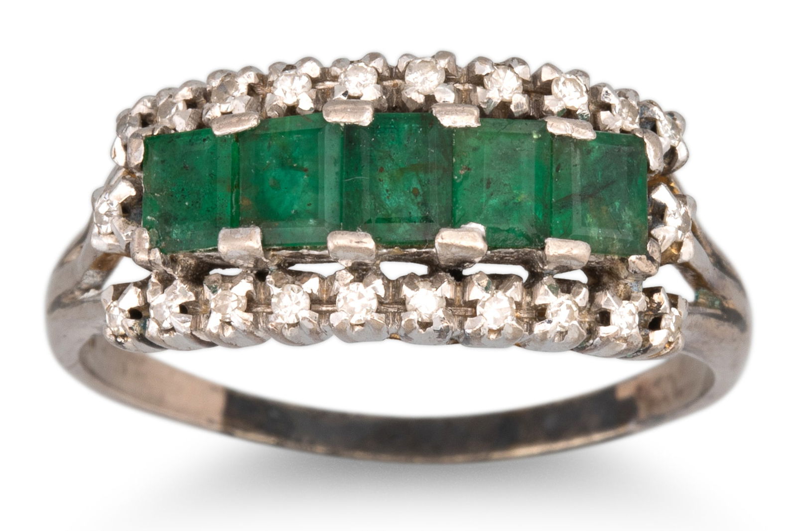 AN EMERALD AND DIAMOND RING, five rectangular emeralds within a diamond border, in 18ct white gold. (1 of 1)
