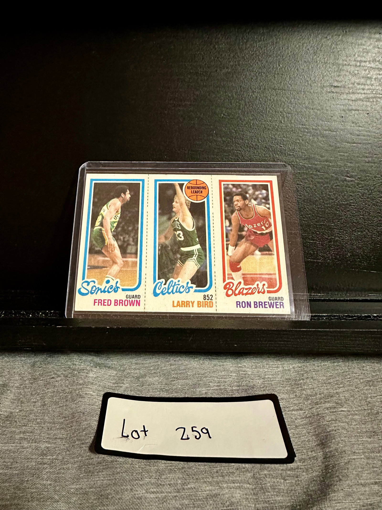 Larry Bird Rookie Card Tri-Card: Item: Larry Bird Rookie Card Tri-Card Please look at the pictures carefully to determine what you believe the condition of this collectible is. We are not professional authenticators, and the conditio