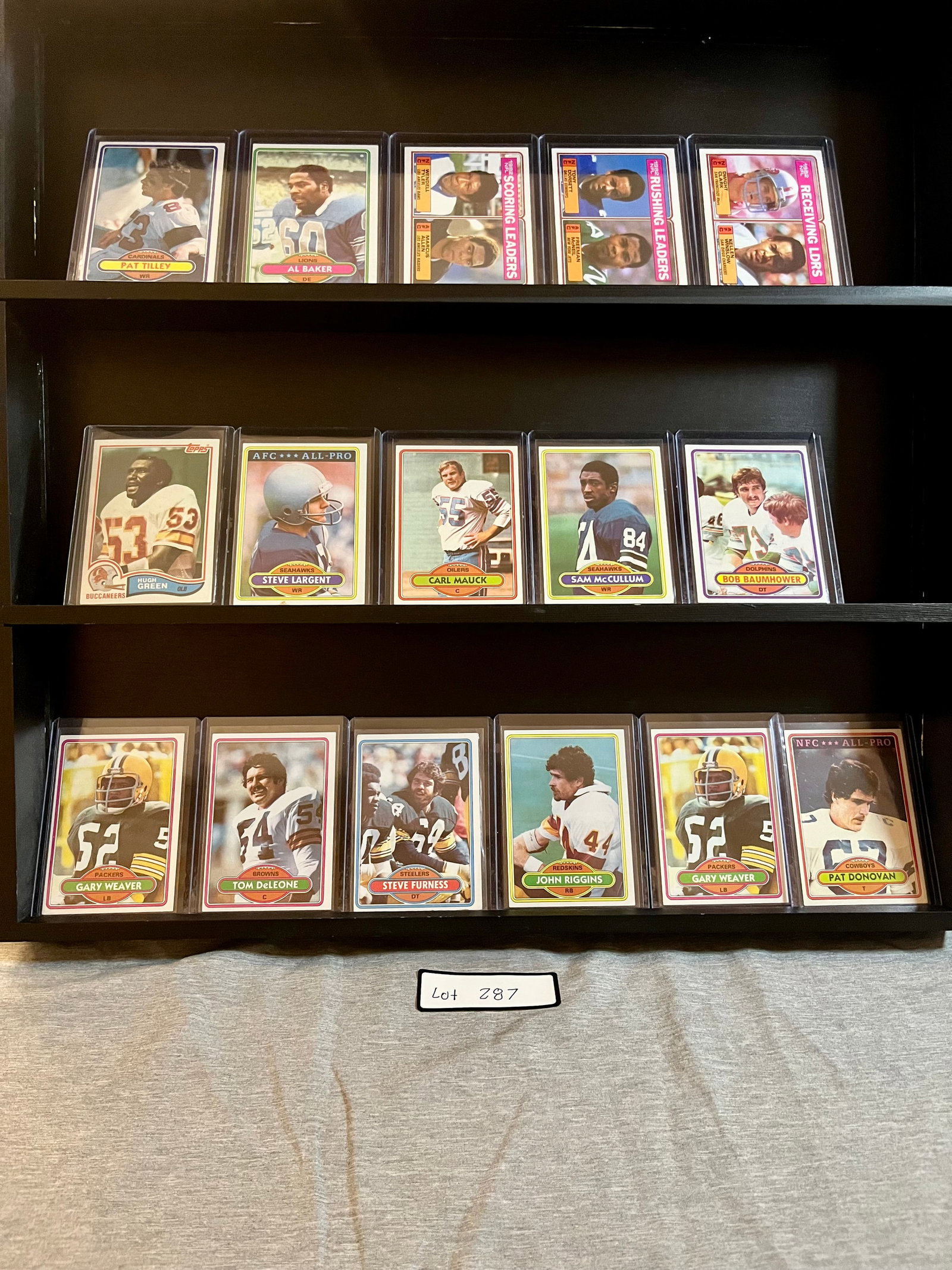Vintage Football Card Lot of (16) Total Cards Including Steve Largent / Marcus Allen / Tony Dorsett: Item: Vintage Football Card Lot of (16) Total Cards Including Steve Largent / Marcus Allen / Tony Dorsett Please look at the pictures carefully to determine what you believe the condition of this coll