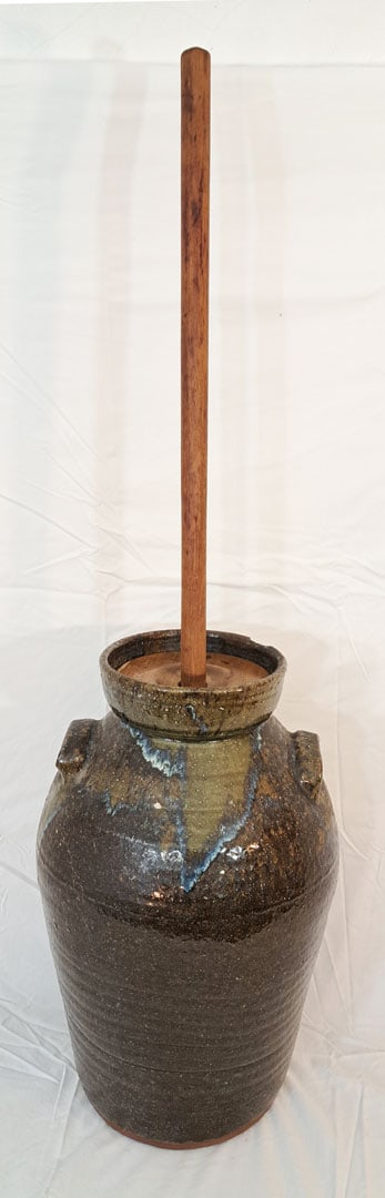 Stoneware Butter Churn with Green Glaze.: 18 3/4" Tall. 38" Tall with handle. 12" Diameter.