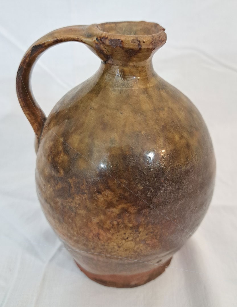 Diminutive Redware handled jug. (1 of 5)