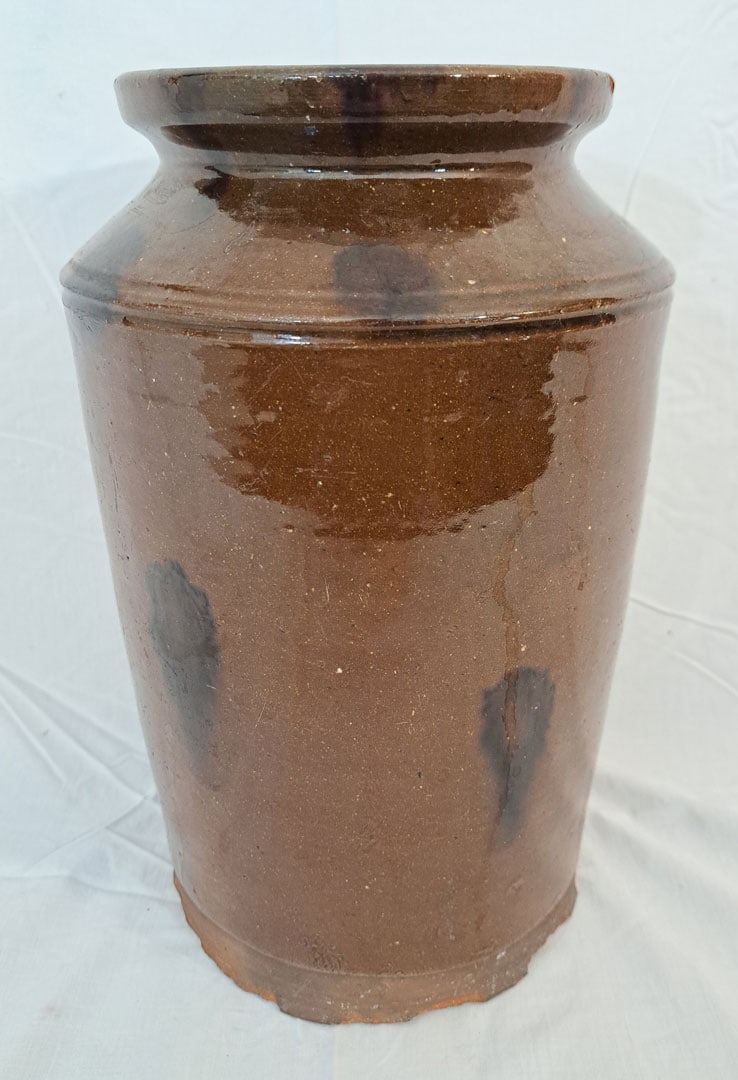 19c Redware jar with tobacco spit decoration.: 12 1/2" Tall x 8 1/2" Wide.