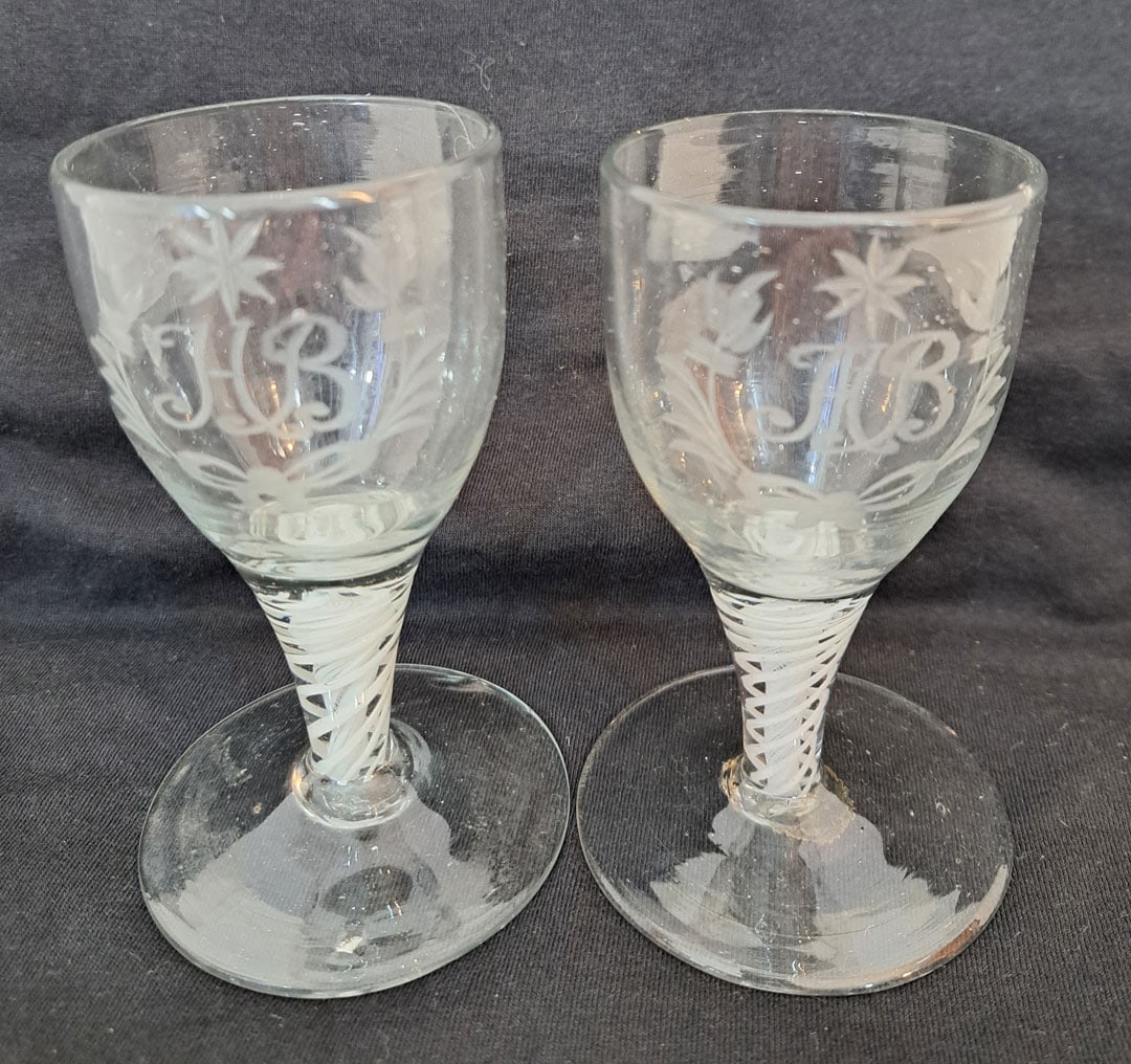 Pair of etched opaque twist wine glasses: 5" Tall. 3" Diameter foot.