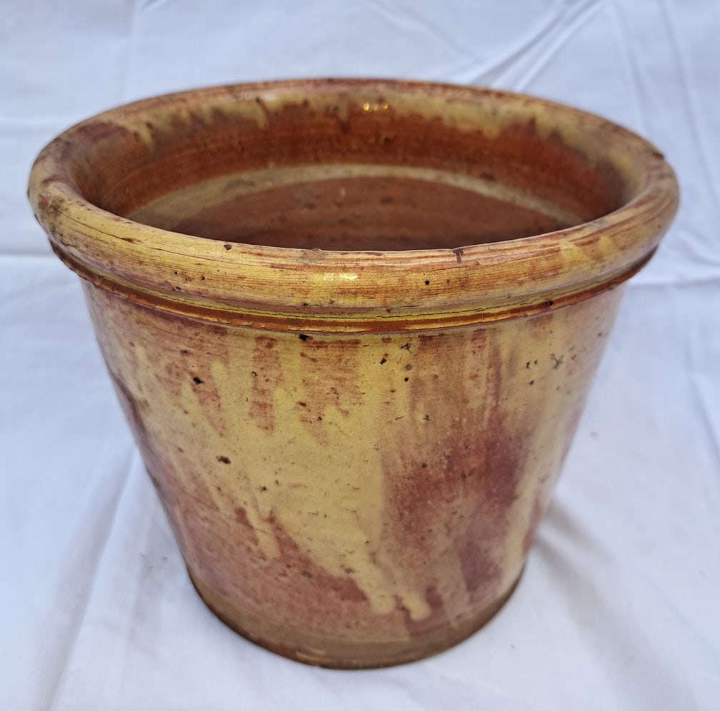 Redware flower pot with salmon glaze. (1 of 6)