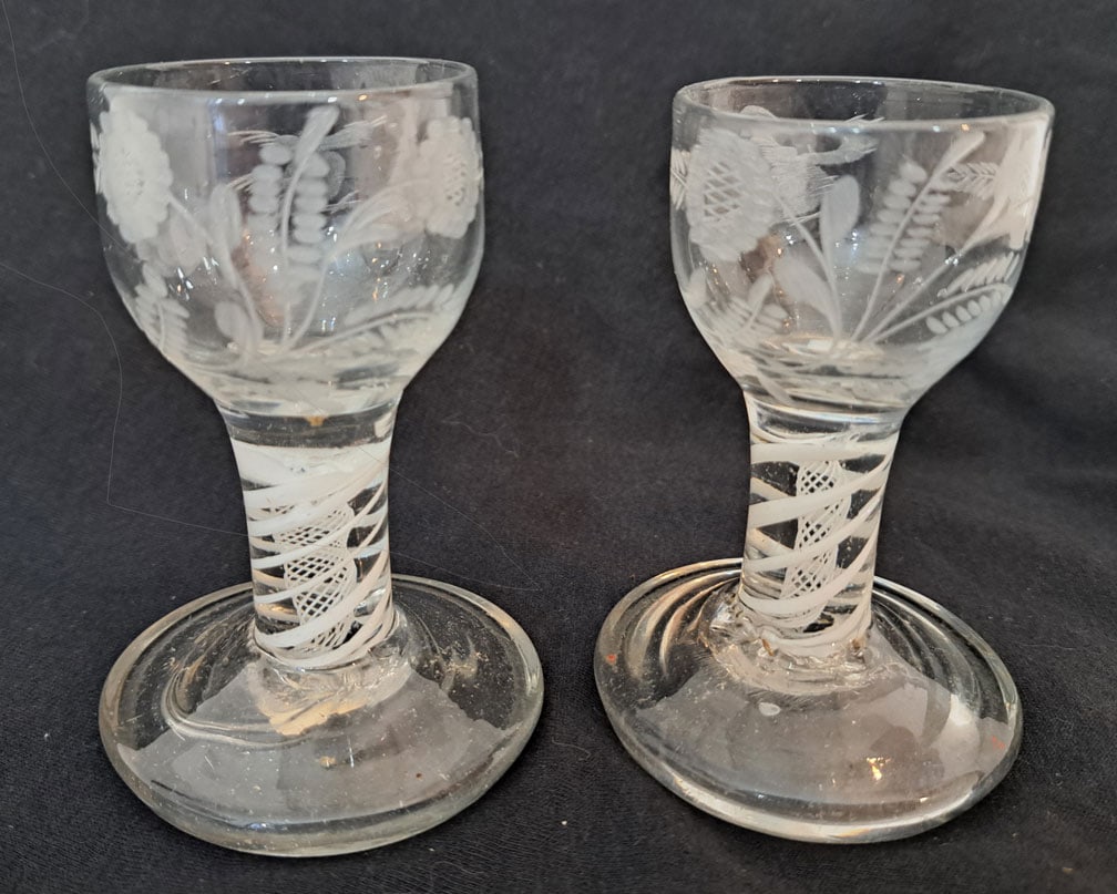 Pair of engraved opaque twist wine glasses.: 4" Tall. 2 5/8" Diameter foot.