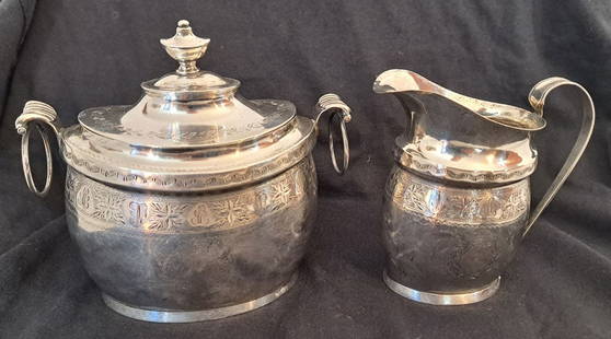 Monogrammed Coin Silver Sugar and Creamer by William Forbes 1820- 1830. NYC.: 19.42 Total ozt Creamer is 5 1/8" Tall. Sugat is 6 1/4" Tall X 6 3/4" wide.