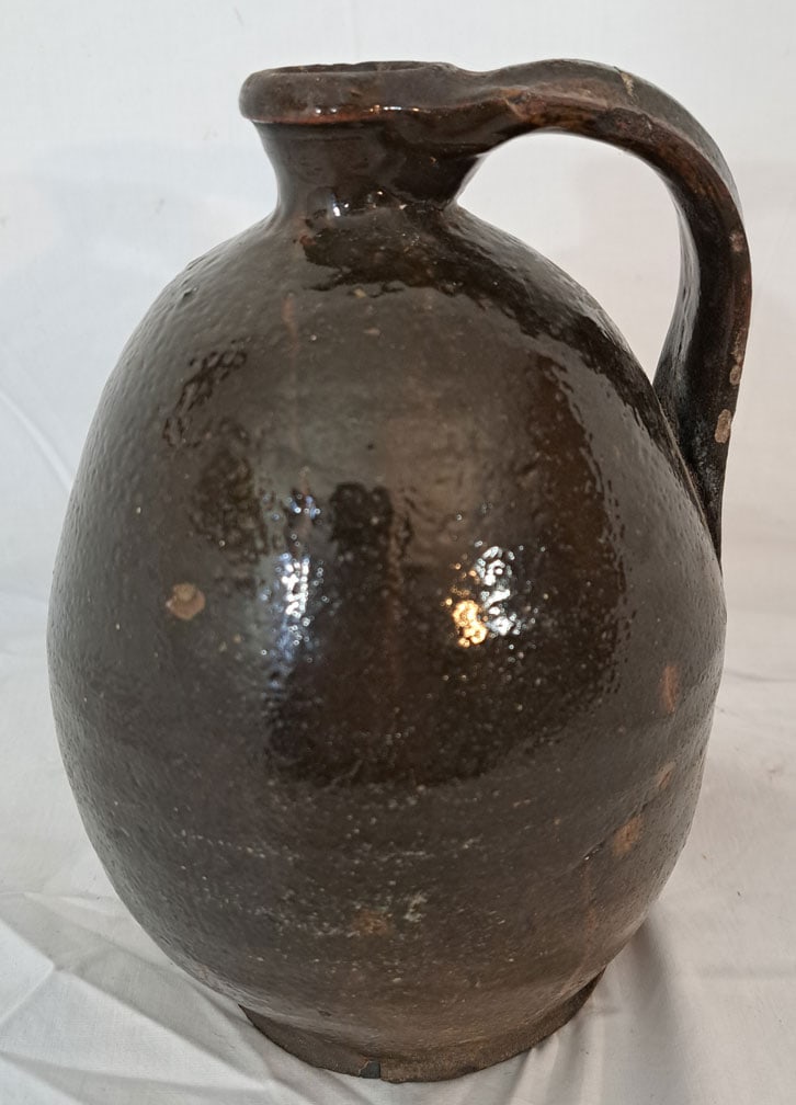 Redware Jug.: 8 1/2" tall X 6" Wide