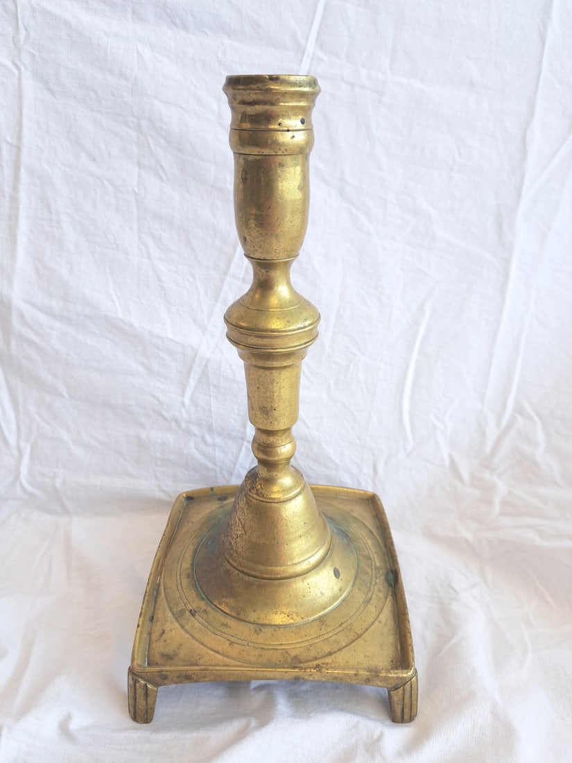 17th Century Brass Candlestick: 10 1/4" tall x 5 1/2" x 5 1/2" at base.