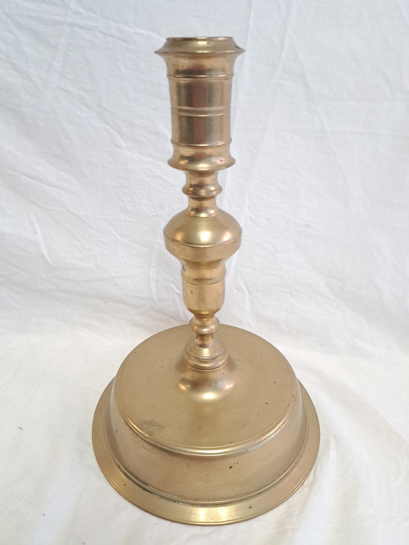 Early Brass Bell Base Candlestick. (1 of 6)