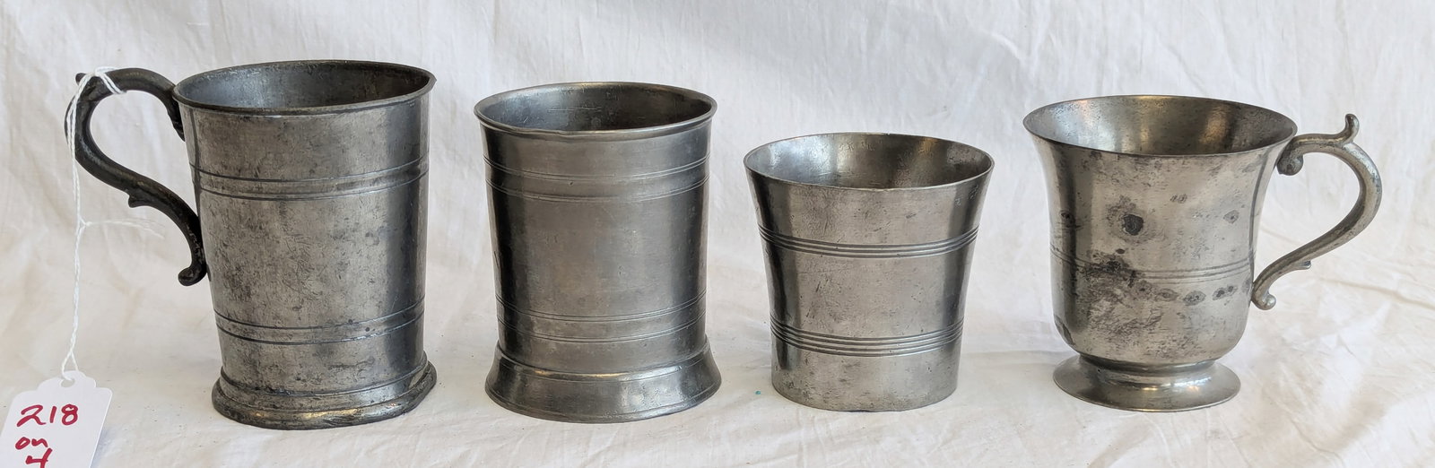 Lot of Four Pewter Cups: Approximately 3 1/2" x 2 1/2" at base- each.