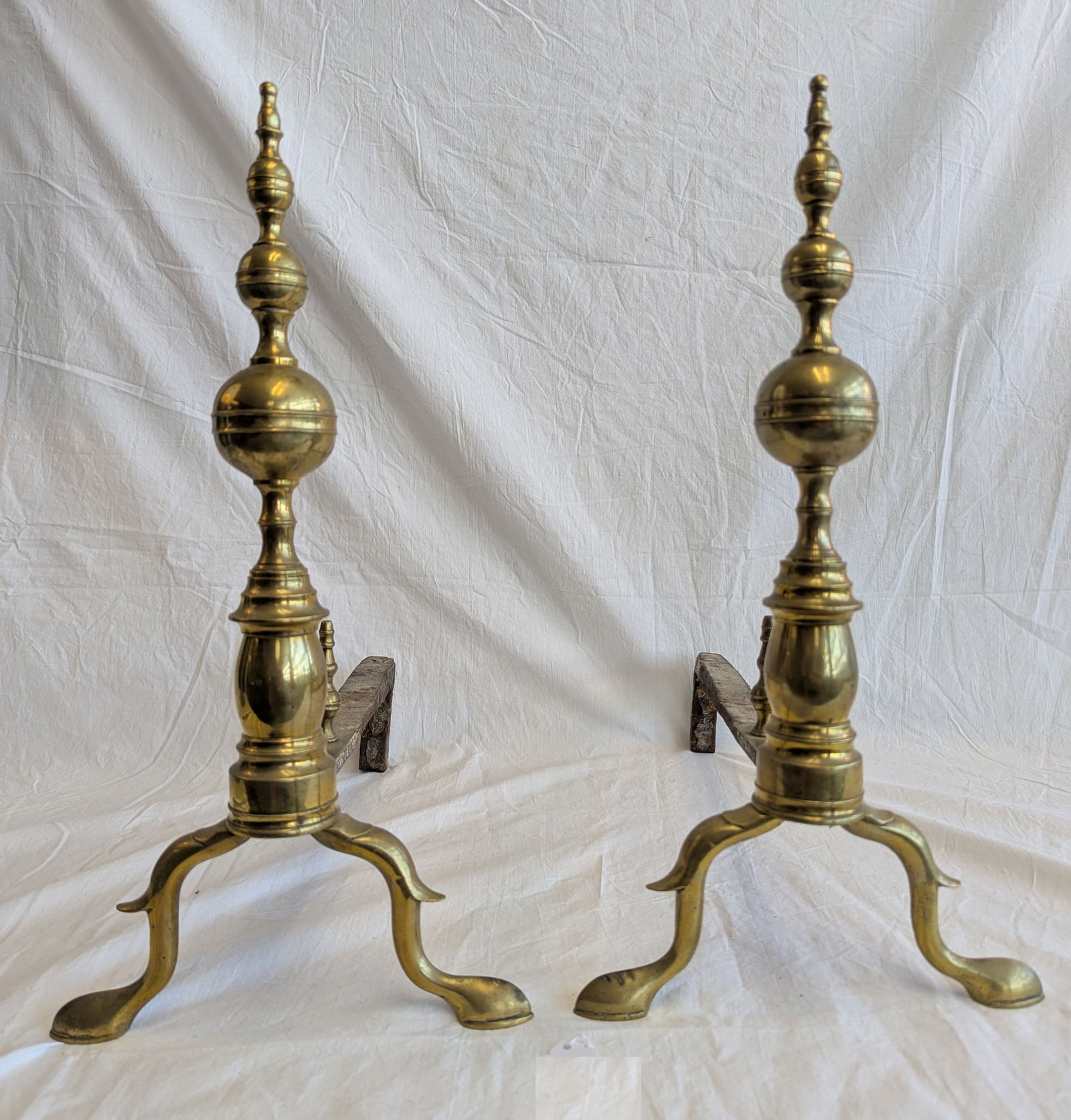 Pair of Brass and Wrought Iron Andirons.: 19" tall x 9 1/2" wide x 17" deep.