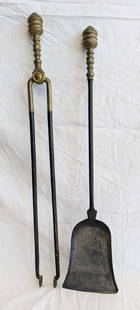 Set of Two Fireplace Tools: Brass and Wrought Iron. 31" long x 6.5" at widest.