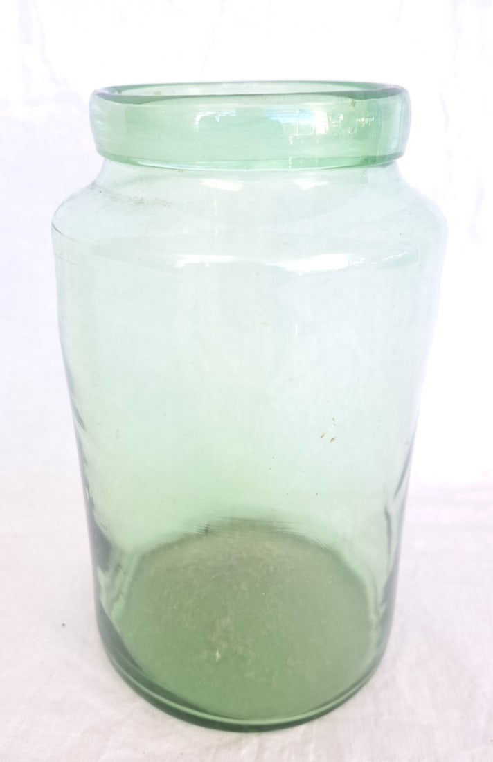 Early Glass Jar: 7 1/2" tall x 4 1/4" diameter