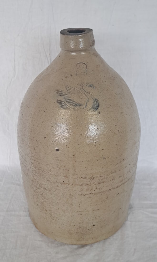Stoneware Jug with Swan from Maine: 14" tall x 8 1/2" wide with handle.