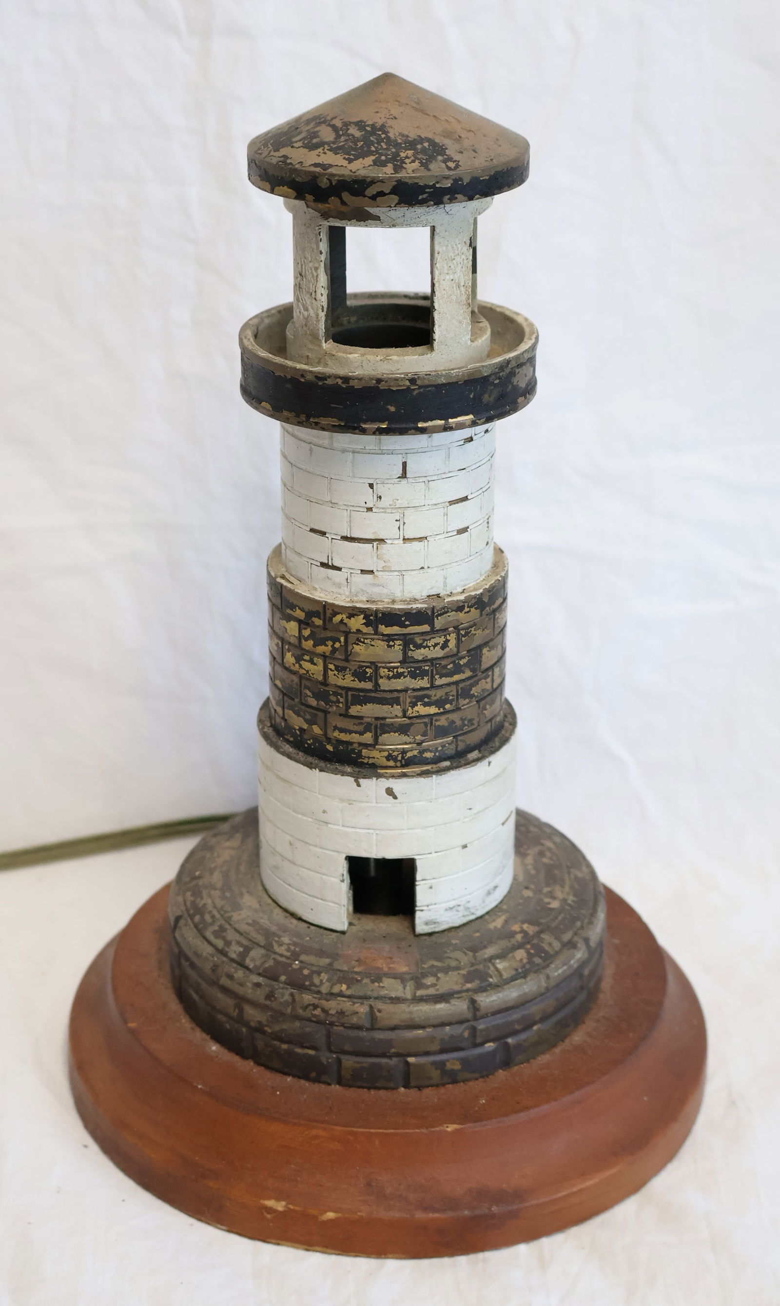 Cast Metal Light House Lamp: 9" tall x 6" at base. Gurley Auction Company provides In House Packing and Shipping and strive to keep costs as reasonable as possible. Please take the time to research the cost of shipping for the it