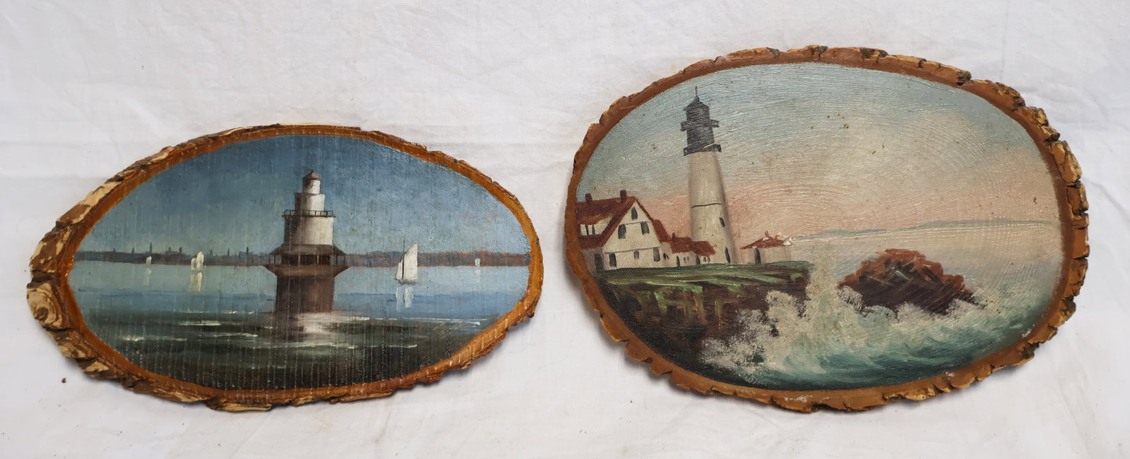 Lot of Two Paintings on Wood Slices from Coastal Maine: Spring Point Light by F.L. Bowie, Portland, Maine 4 1/2" x 8 1/2" x 1/2" Portland Head Light: 8 1/2" x 6" x 1/2" Gurley Auction Company provides In House Packing and Shipping and strive to keep