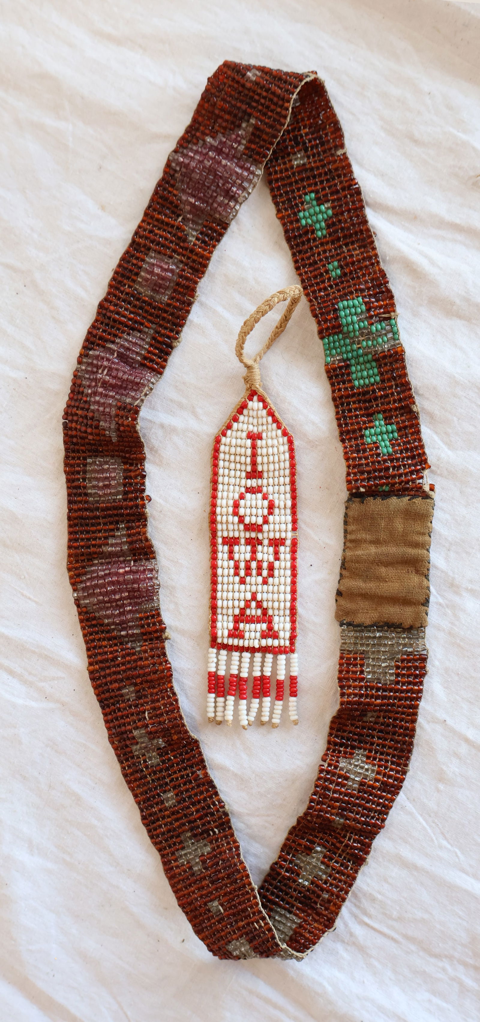 Lot of Two Pieces of Native American Bead Work: Hat Band 21" x 7 1/8" IOWA: 5 1/4" x 1" Gurley Auction Company provides In House Packing and Shipping and strive to keep costs as reasonable as possible. Please take the time to research the