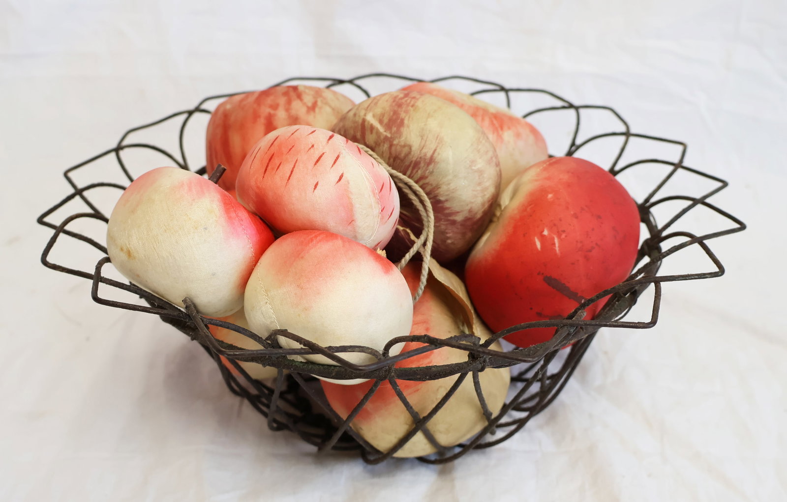 Wire Basket with Lot of Silk Apples; 7 Large Apples and Three Smaller Apples with hanger: Basket 4 1/4" tall x 11 1/4" Apples: Largest Approximately 3 1/2" x 2" Gurley Auction Company provides In House Packing and Shipping and strive to keep costs as reasonable as possible. Please take the