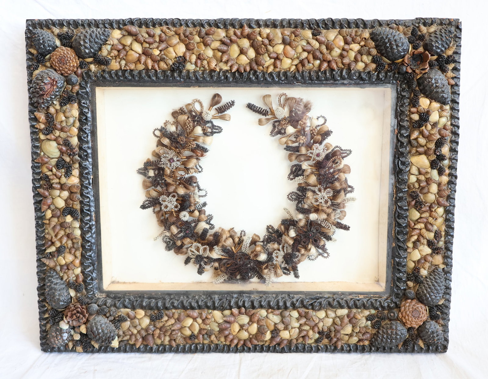 Hair Wreath in Shadow Box with Frame that has Applied Seashells: Large: 14" x 5 1/2" Smallest: 7 1/2"x 3 1/2" Gurley Auction Company provides In House Packing and Shipping and strive to keep costs as reasonable as possible. Please take the time to research the cost