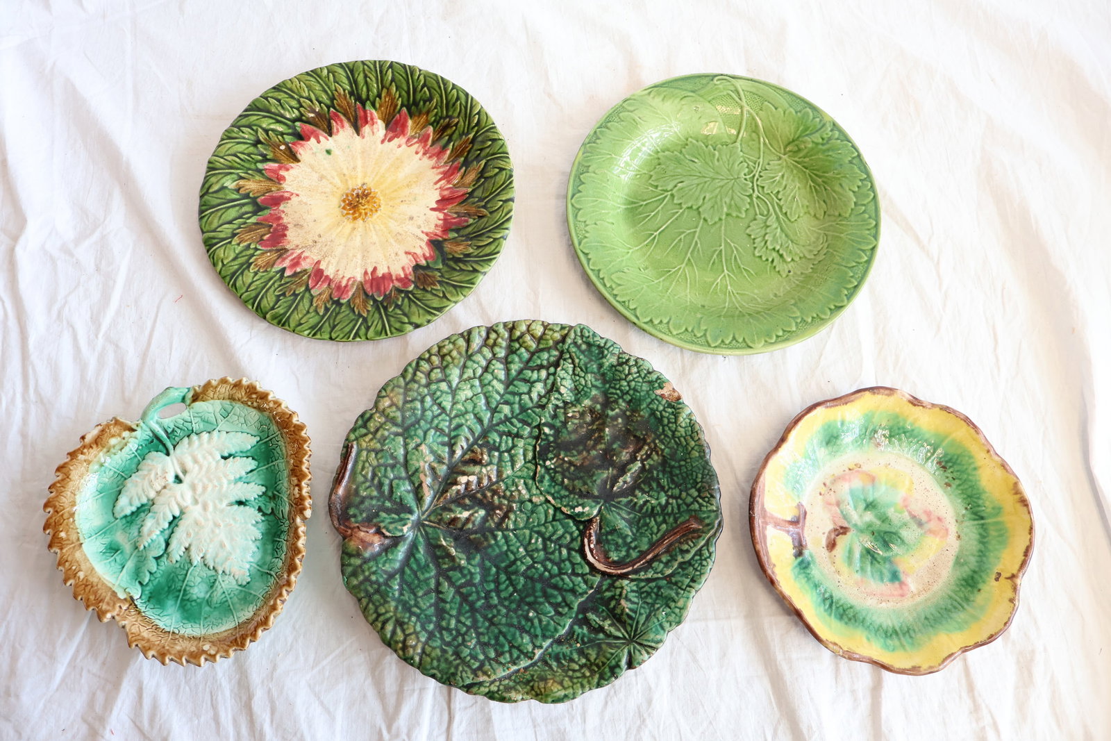 Lot of Five Majolica Plates: Smallest: 7" x 6 1/5" Largest: 9 1/2" Gurley Auction Company provides In House Packing and Shipping and strive to keep costs as reasonable as possible. Please take the time to research the cost of shi