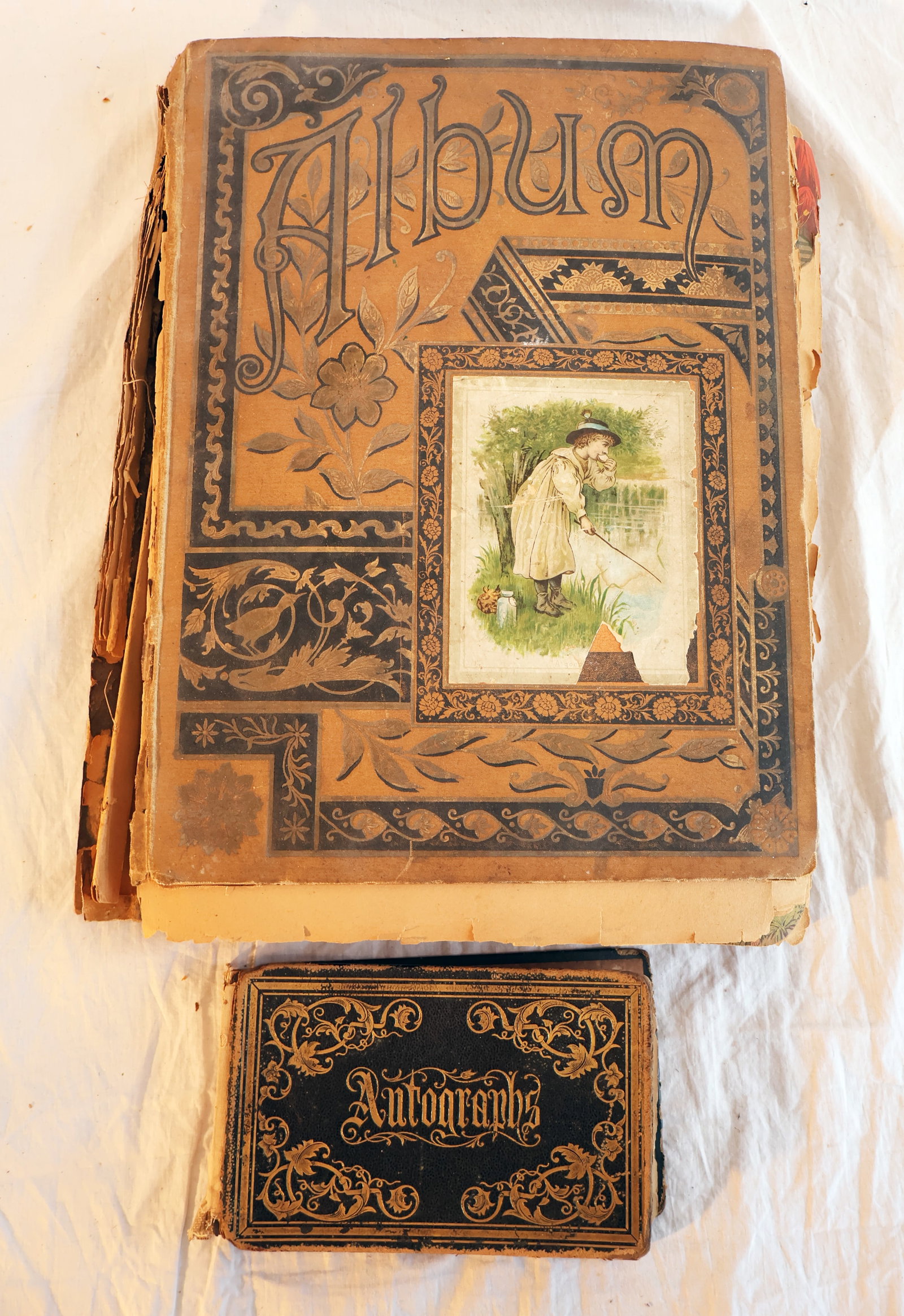 Lot of Two Ephemera Items: 1888 Scrapbook with Die Cuts and Trade Cards & 1870's Autograph Book: Autograph Album with Calligraphy: 4 1/4" x 7" Scrap Book: 11 1/2" x 15" Approximately 45 pages Gurley Auction Company provides In House Packing and Shipping and strive to keep costs as reasonable as p